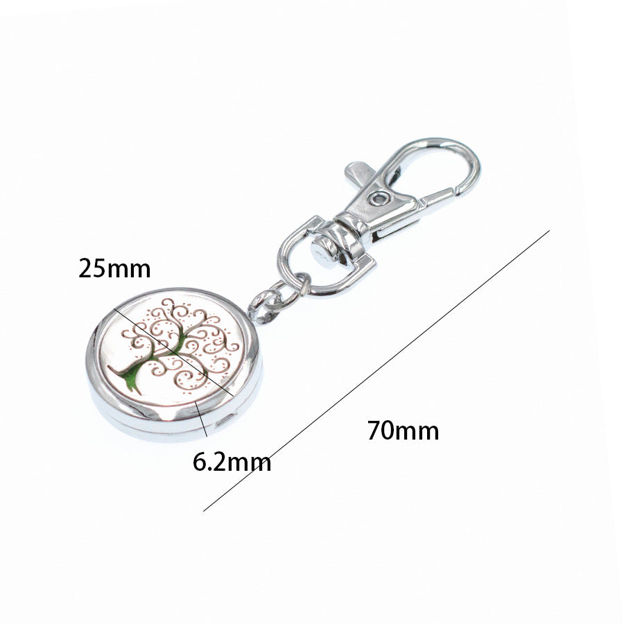 Wholesale Alloy Angel Wings Hollow Aromatherapy Essential Oil Keychain